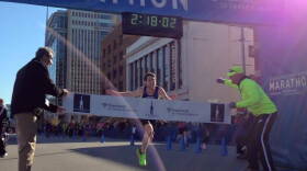 Jesse Davis crosses the finish line at the Monumental Marathon Saturday.