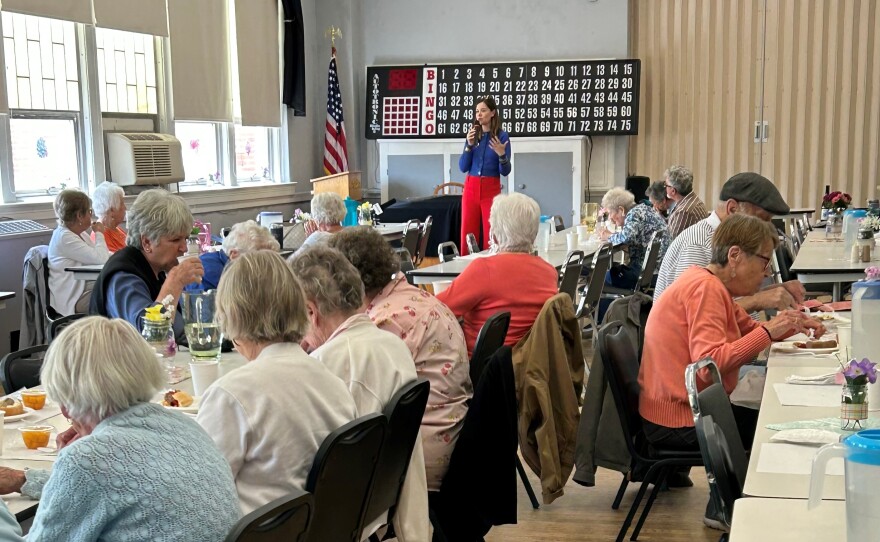 Southern Maine Agency on Aging CEO Megan Walton speaks with dozens of seniors at the Biddeford Community Cafe luncheon on June 2, 2025.