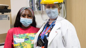 Waterloo, Iowa resident Aquarius Bunch is with Dr. Sharon Beth Larson of the University of Iowa Hospitals and Clinics during a follow-up appointment in June.