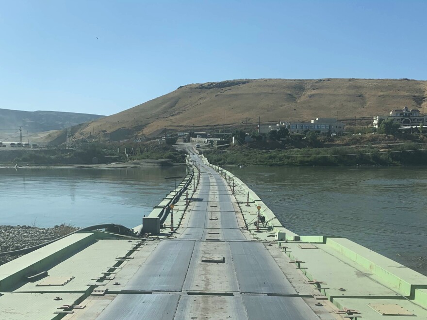 Crossing the bridge over the Tigris river into Syria from Iraqi Kurdistan.