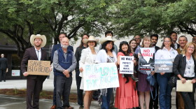 Anti-wall advocates and plantiffs gather for a group photo outside of a federal courthouse in El Paso on Friday, October 2.