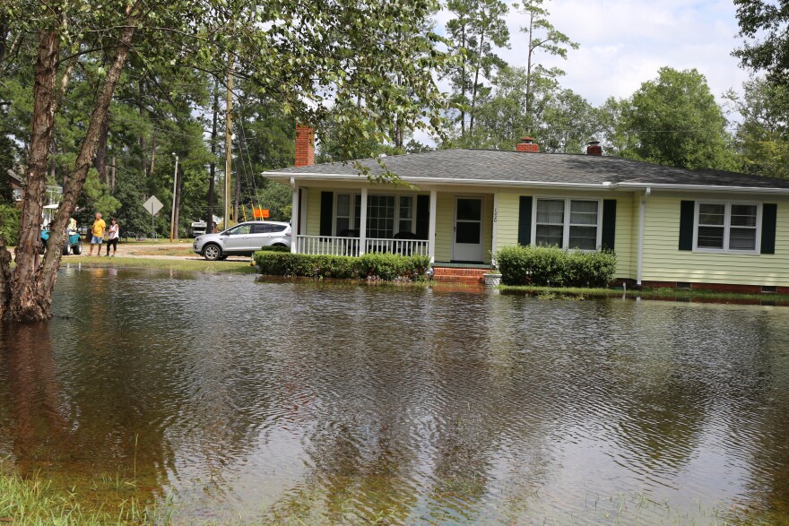 Doug and Sissy Owen's home quickly flooding.  They just moved here six months ago.