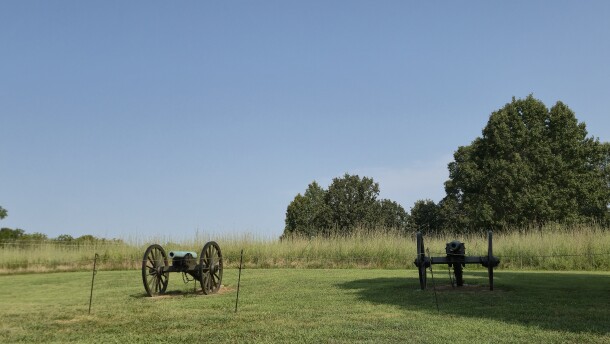 Two cannons look out near the visitor's center at Willson's Creek National Battlefield.