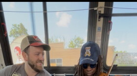 Musicians Nick Rose and Preston Charles the Third entertained commuters on TANK buses for a day.