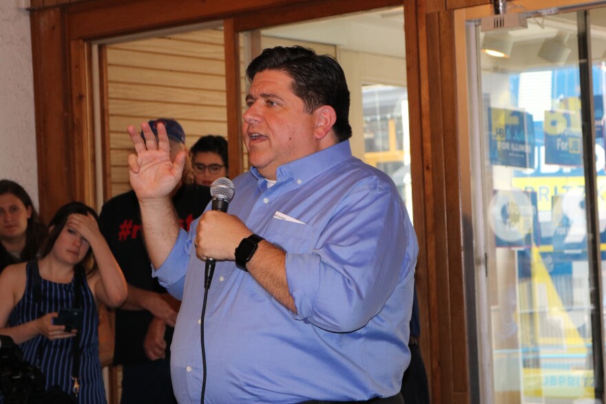JB Pritzker speaks to a crowd
