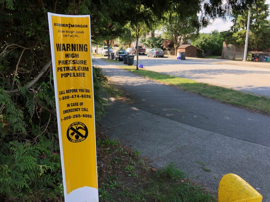 Markers warning of the existing underground Trans Mountain Pipeline through the Vancouver, B.C., suburb of Burnaby on Sept. 4.  