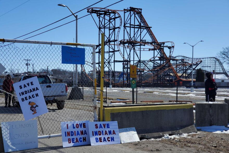 Signs left outside the main gate to Indiana Beach during the rally to save the amusement park in March.