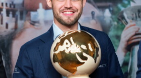 Norwegian Magnus Carlsen holds the 2019 Croatia Grand Chess Tour trophy.