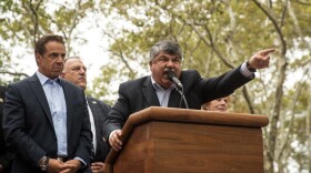 (Left to right) New York Gov. Andrew Cuomo looks on as Richard Trumka, president of the AFL-CIO, speaks during a rally of hundreds of union members in support of IBEW Local 3 (International Brotherhood of Electrical Workers) at Cadman Plaza Park, Sept. 18, 2017 in the Brooklyn borough of New York. (Drew Angerer/Getty Images)