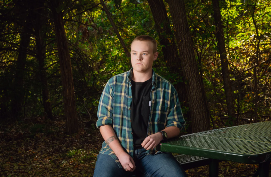 Simon Shepherd, 22, poses for a portrait at Bear Creek Park in Keller on Nov. 12, 2025. Shepherd, a transgender resident from North Texas, testified before the State Affairs Committee hearing regarding Senate Bill 8, known as the "bathroom bill.” Transgender Texans are bracing for a new wave of public scrutiny as the bill is set to go into effect in December.