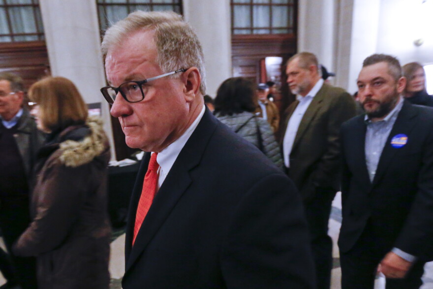 Pennsylvania Sen. Scott Wagner, R-York County, one of the candidates seeking the Republican Party's nomination to challenge Democratic Gov. Tom Wolf's re-election bid, mingles during a meet and greet session before a candidate debate between the Republican candidates, Saturday, Jan. 20, 2018, in Pittsburgh. (AP Photo/Keith Srakocic)