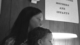 woman and child in a WIC office