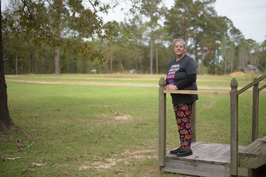 Julie Kerry, on the steps to her home near Colfax, was able to access care for her addition remotely by phone, thanks to emergency changes to federal and state telehealth regulations during the pandemic.