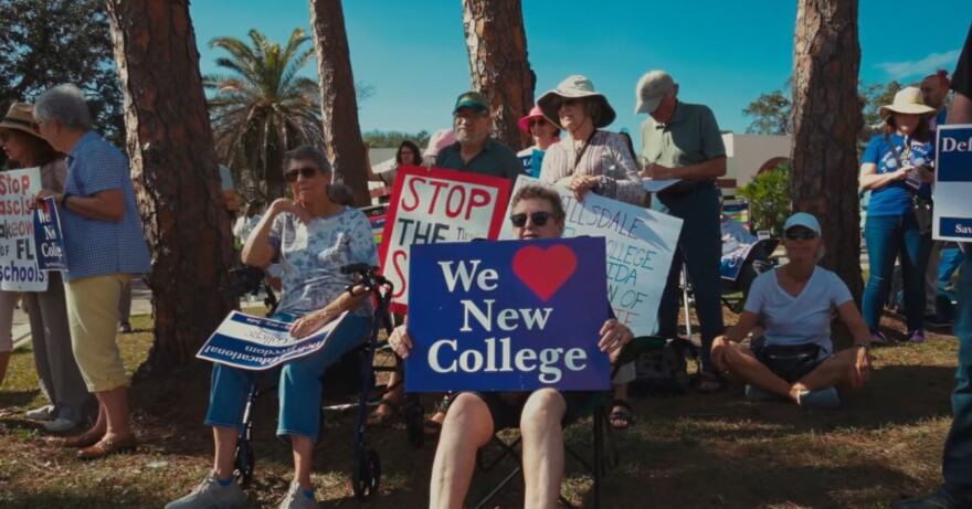 Older people holding up we love new college signs protesting 