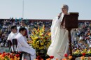 FILE - Pope Leo XIV, then Apostolic Administrator of Chiclayo Robert Prevost, preaches during a Corpus Christi celebration in a stadium in Chiclayo, Peru, June 19, 2015. (AP Photo/Julio Reano, File)