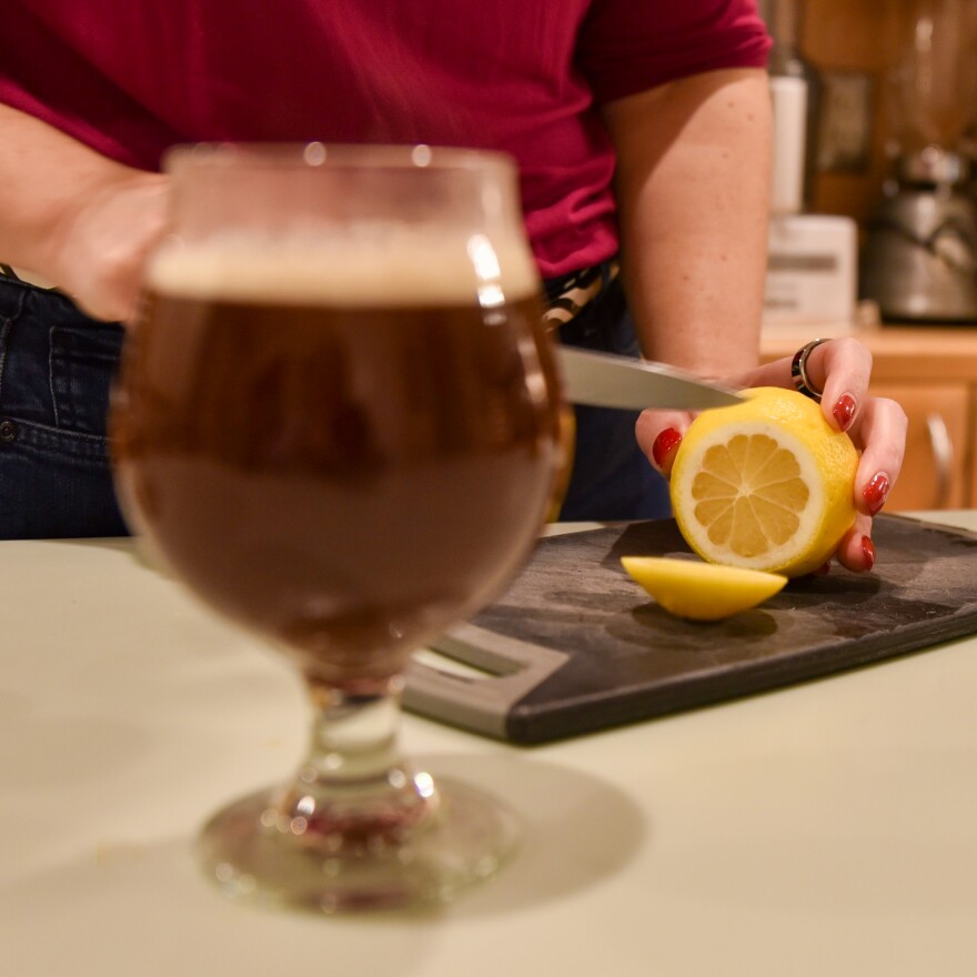 Garnish with a slice of citrus.