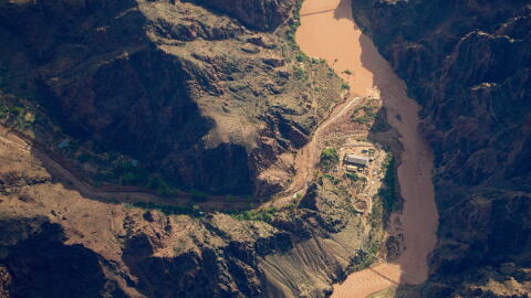 Bright Angel Canyon, damaged by flash floods, runs into the Colorado River in the Grand Canyon, Monday, Aug. 31, 2026, at Grand Canyon National Park, Ariz.