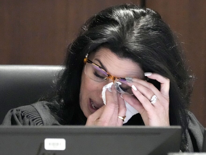 Waukesha County Circuit Court Judge Jennifer Dorow wipes away tears while talking about victim statements during her closing remarks before sentencing Darrell Brooks to six consecutive life sentences in a Waukesha County Circuit Court in Waukesha, Wis., on Wednesday, Nov. 16, 2022.