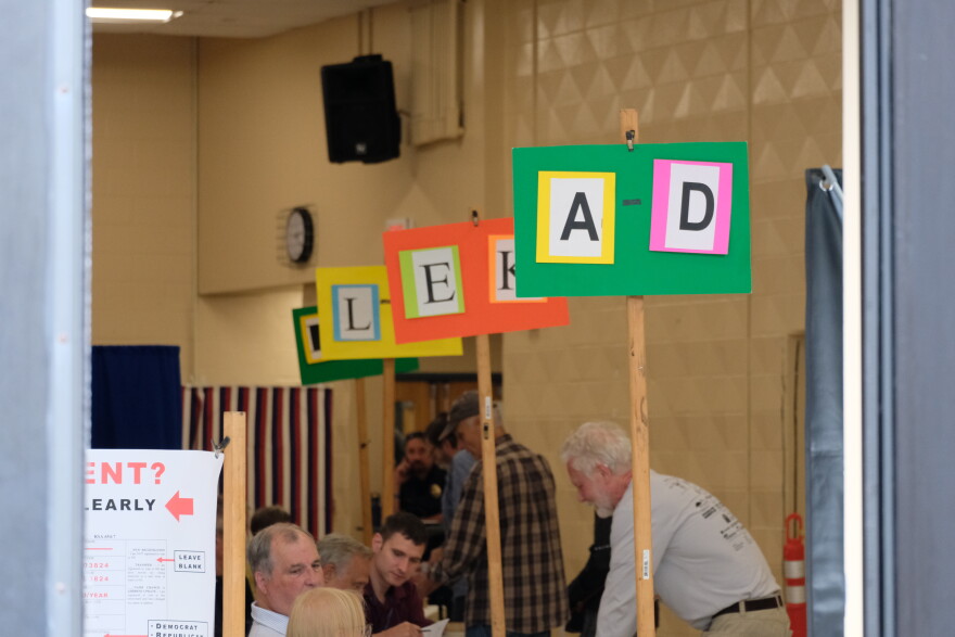 Voters and election workers in action at Oyster River High School in Durham, Sept. 8, 2026.
