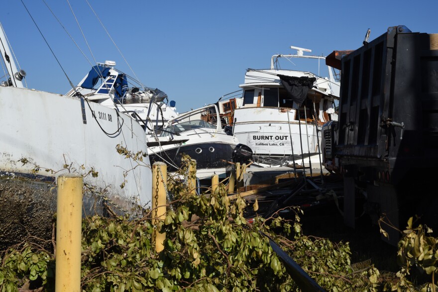 Boats piled on top of each other after Hurricane Ian in 