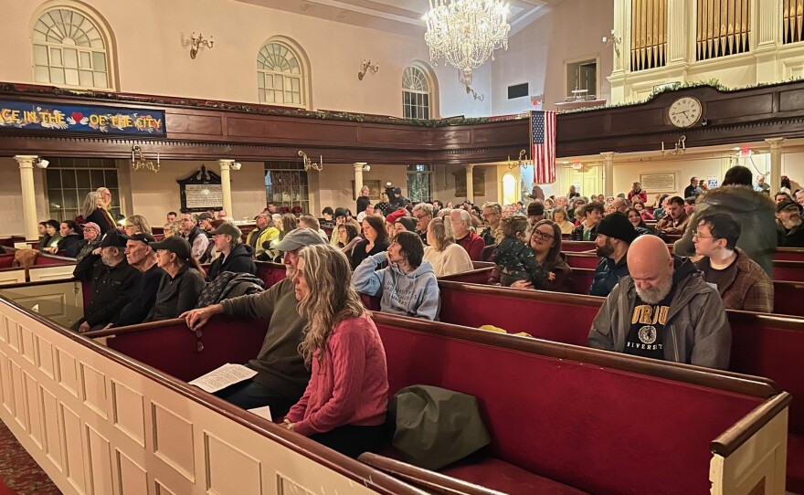 Hundreds gathered at First Parish Church in Portland for the vigil.