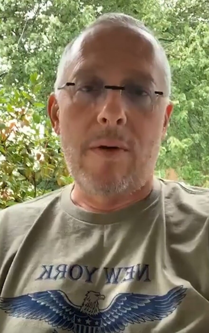 Michael Caputo speaks during a September 2020 Facebook Live video outside his East Aurora home while wearing a New York Watchmen t-shirt.