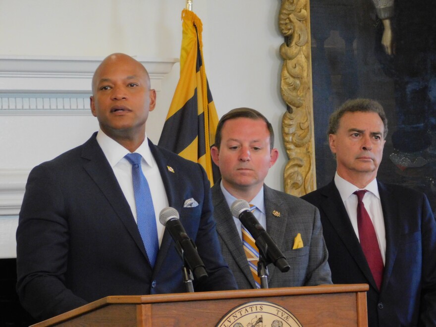 Gov. Wes Moore (left) speaks in support of the Utility RELIEF Act beside Senate President Bill Ferguson (center) and Senate Education Energy and the Environment Chair Brian Feldman on Monday in the Governor's Reception Room in Annapolis, Md.