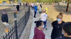 The first day of early voting saw long lines at Lion's Field Park in San Antonio.