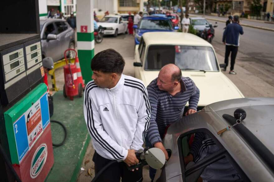 A driver refuels at a gas station as others wait behind in a long line in Havana, Cuba, Friday, Jan. 30, 2026. (Ramon Espinosa/AP)