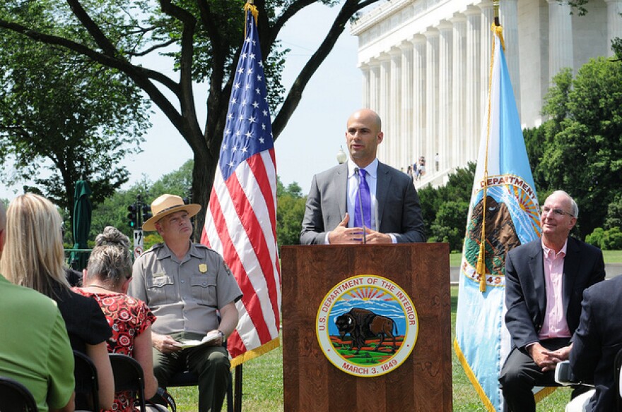Let’s Move! Executive Director and White House Senior Policy Advisor on Nutrition Sam Kass speaks at a 2013 event with the National Parks Service and the Department of the Interior. 