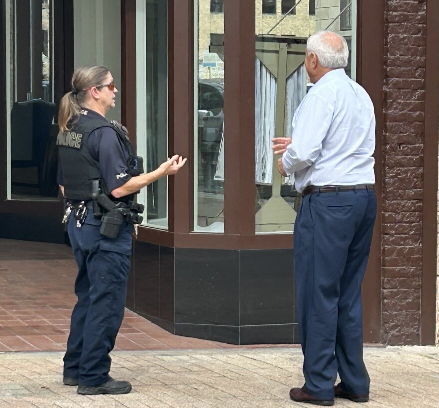 Shreveport Police Officers patrol the streets downtown. Some talk with officers about a concern or crime.