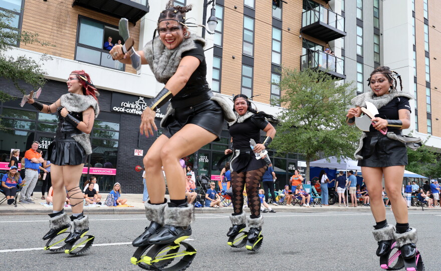 Paraders dressed as Vikings bounce down University Avenue during the University of Florida Homecoming parade in Gainesville Friday, Oct. 9, 2026. (Isabel Kraby/WUFT News)