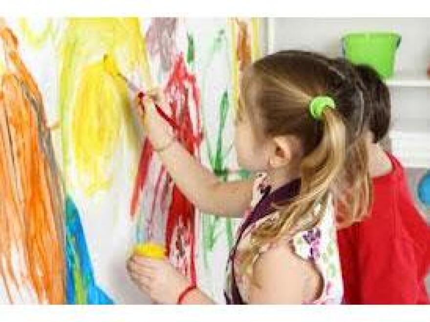 Young children painting