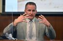 Former Louisville Police Officer Brett Hankison discusses the muzzle flashes that he said he saw coming from the apartment as he is questioned by the prosecution in Louisville, Ky., Wednesday, March 2, 2022. (AP Photo/Timothy D. Easley, Pool)