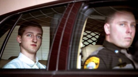 Robert Tulloch, left, leaves the Grafton County courthouse in North Haverhill, N.H., following a hearing in 2001.