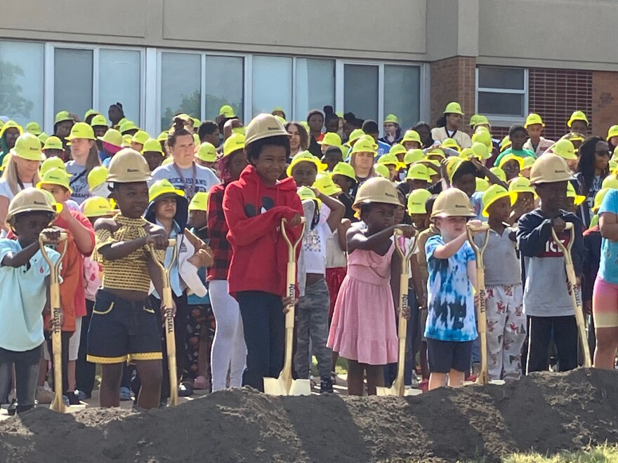 Rock Island Academy students take part in the groundbreaking for a $7.9-million addition to the school at 930 14th St., on Thursday, May 28, 2026.