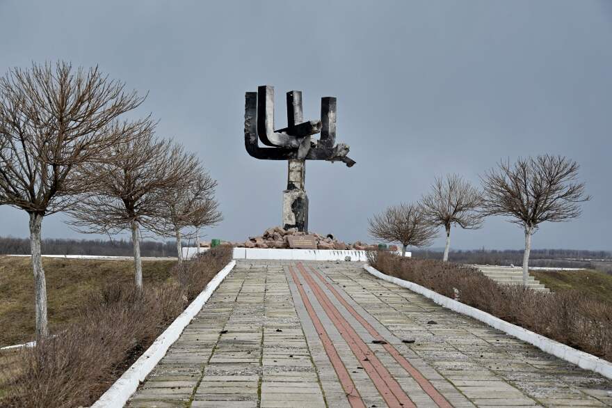A menorah monument, located at the entrance of the Drobitsky Yar Holocaust memorial complex on the eastern outskirts of Kharkiv, is pictured on Sunday, a day after it was wrecked in a Russian shelling.