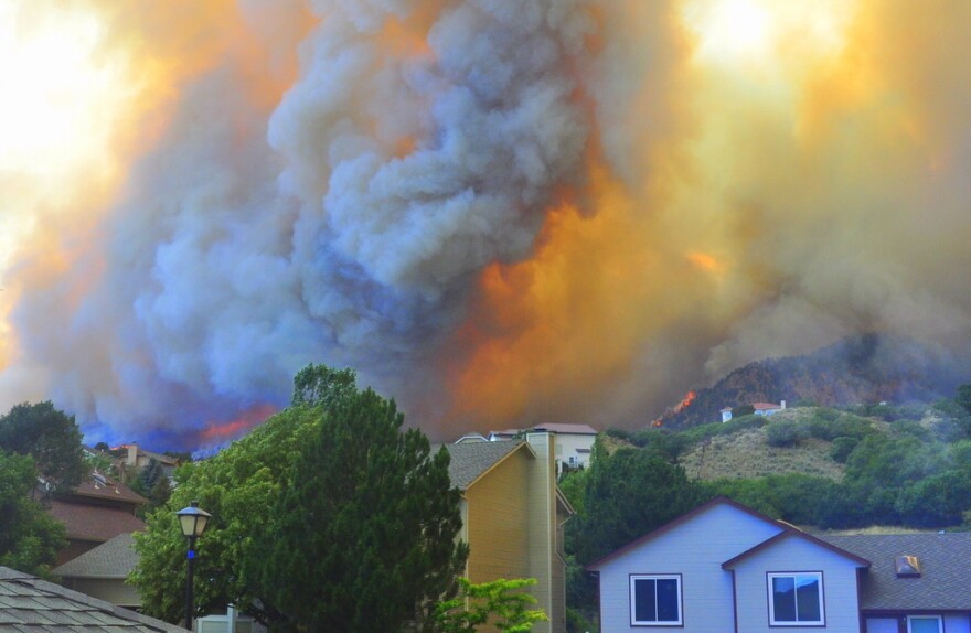 The fire was already burning in their Waldo Canyon neighborhood when Janet Wilson and her partner Stephen Gandy finished packing their cars and joined the evacuation.