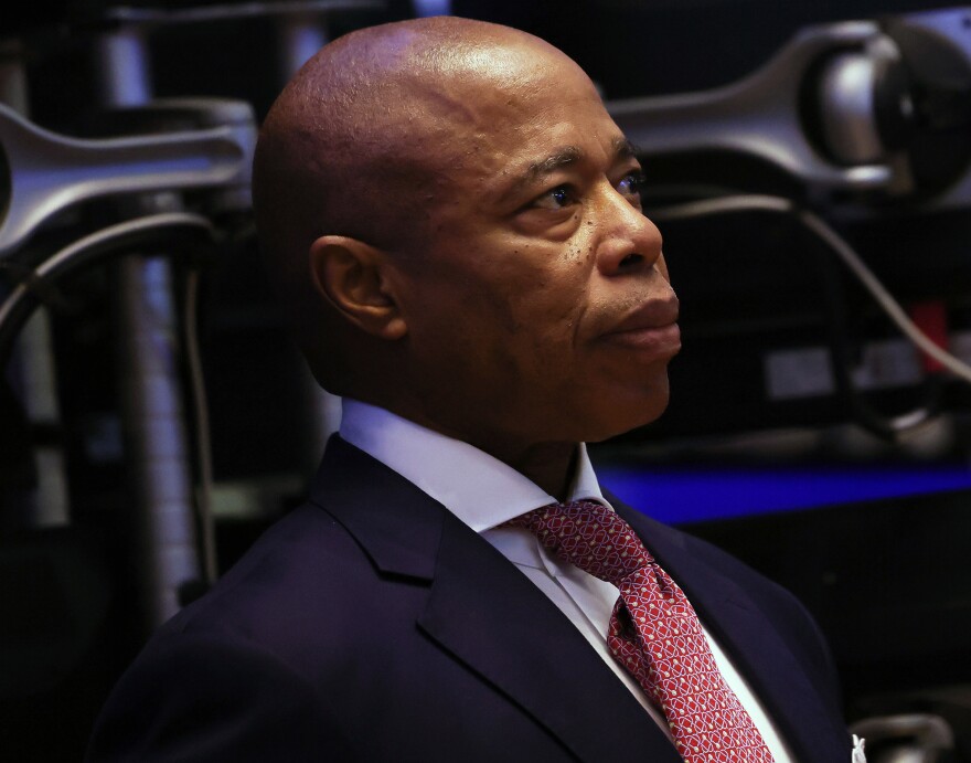 New York City Mayor Eric Adams visits the New York Stock Exchange on Nov. 17. This week, he announced that officials will begin hospitalizing more homeless people by involuntarily providing care to those deemed to be in "psychiatric crisis."