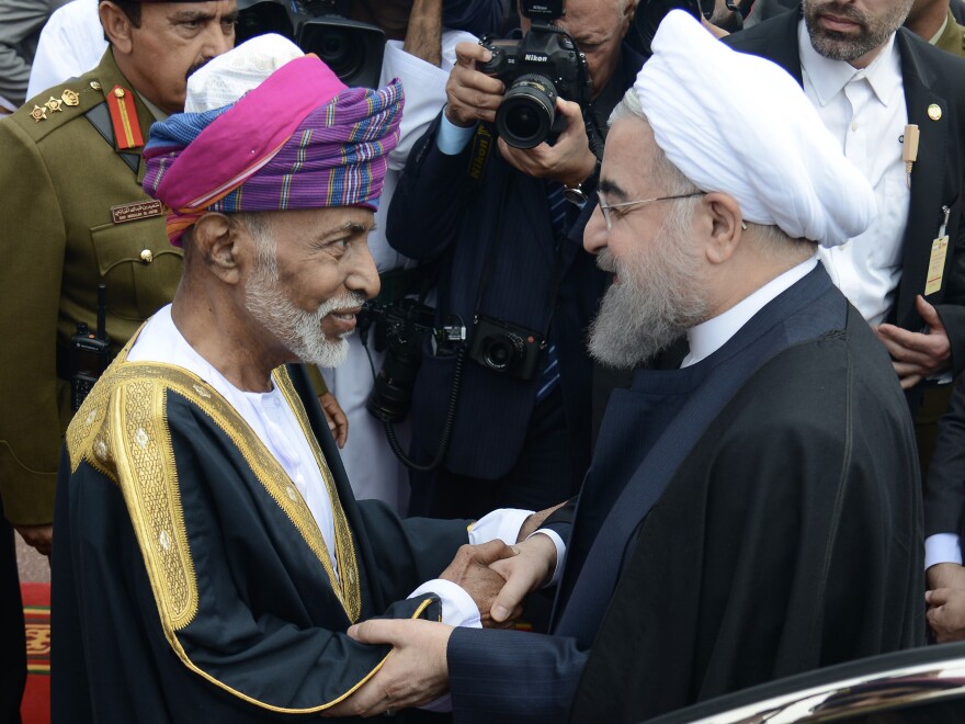 Oman's Sultan Qaboos (left) greets Iranian President Hassan Rouhani in Muscat in February 2017.