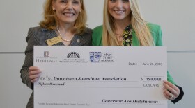 From left: Stacy Hurst, director of the Department of Arkansas Heritage, and Lindsey Wingo, Downtown Jonesboro Association.