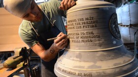 A Verdin employee works on the mold for the Spirit of Minnesota Tribute Bell cast Tuesday in Cincinnati.