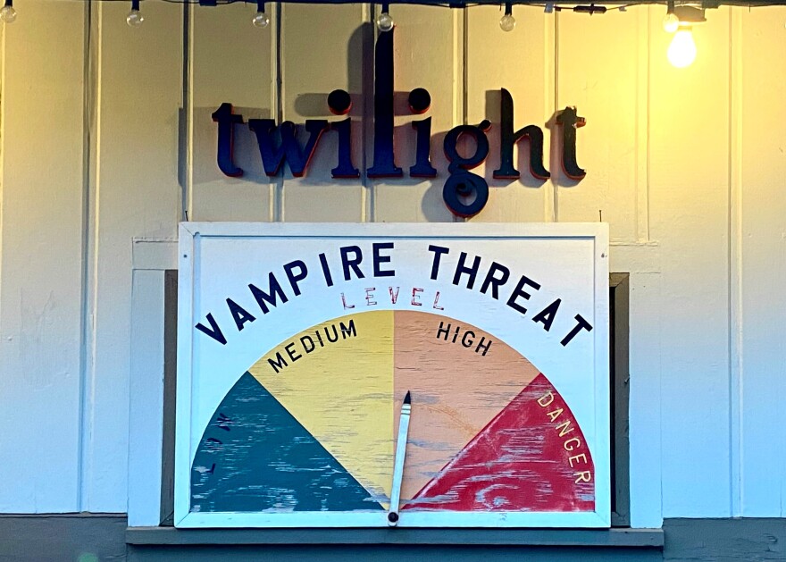 Posted on the side of a convenience store, warning visitors that the threat of vampires is high