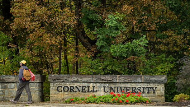 A student walks past a Cornell University sign in Ithaca, N.Y., Monday, Sept. 28, 2026.