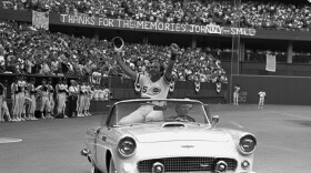 Cincinnati Reds catcher Johnny Bench rides around Riverfront Stadium acknowledging the cheers of the crowd on Saturday night, September 17, 1983. Bench retired at the end of that season. 