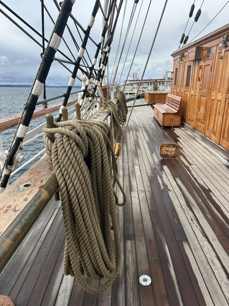 Coiled ropes on the deck of a tall ship.