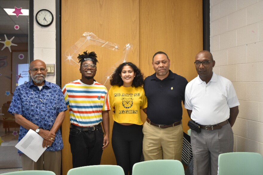Deshawn Elam (second from left), Joanna Martinez (third from left) and Arwin Smallwood (second from right) at the Community Information Session in Halifax on August 5, 2019.