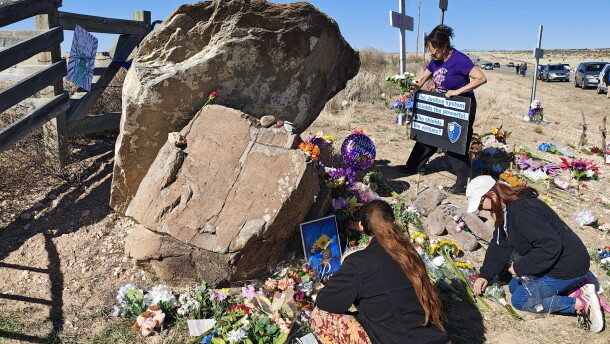 Protesters tend to memorials for Epstein abuse survivors outside the front gate of the sex offender's former Zorro Ranch southeast of Santa Fe. Te site is host to several allegations og abuse going back decades.