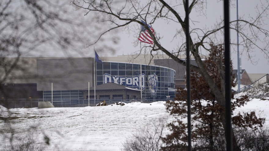 Oxford High School is shown in Oxford, Mich., Tuesday, Nov. 30, 2021, where authorities say a student opened fire at the school. (AP Photo/Paul Sancya)