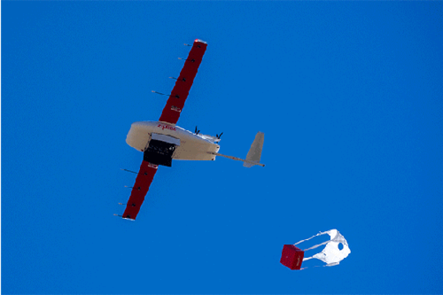 A drone drops a package during a demonstration in South Jordan on Tuesday, Oct. 4, 2022